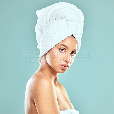 Buy stock photo Portrait, woman and towel for skincare in blue background, beauty and routine for healthy skin. Face, female model and self care, natural glow for cosmetics or dermatology with haircare in studio