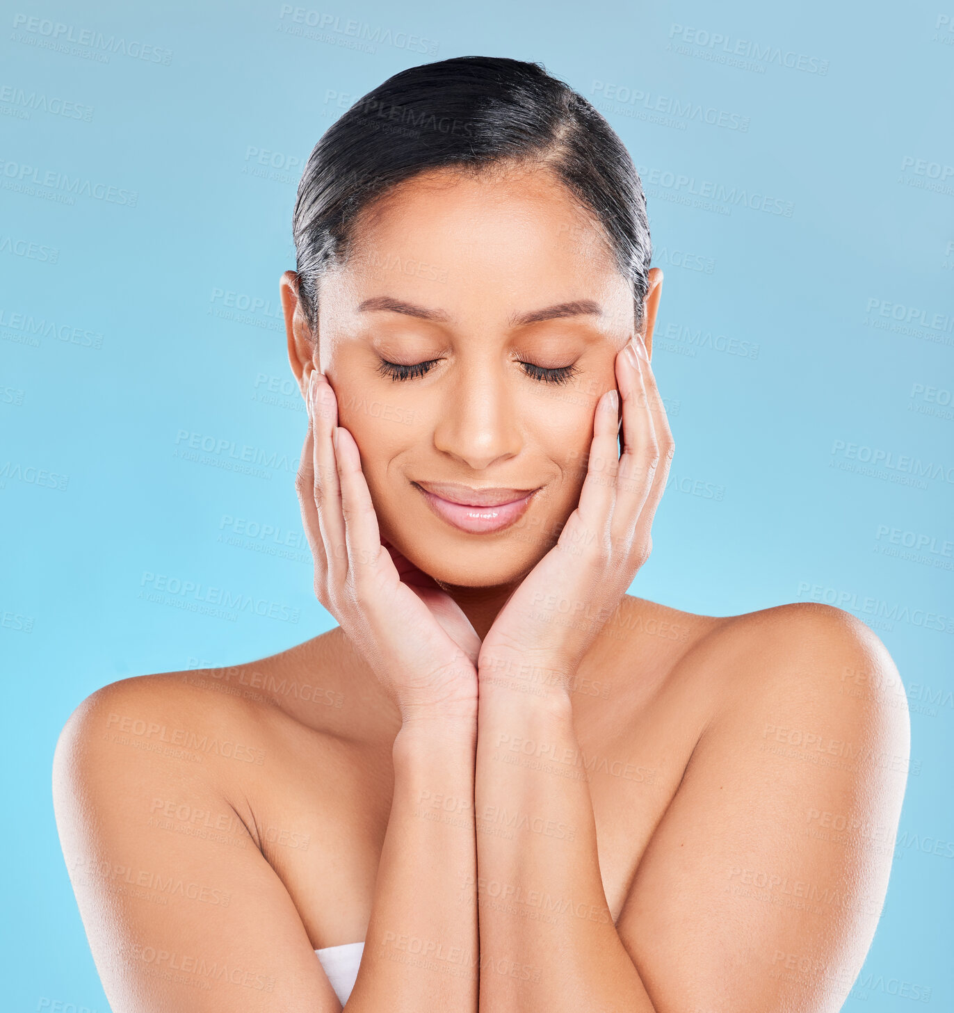 Buy stock photo Skincare, woman and hands holding face for natural shine or glow and dermatology isolated in studio. Female person, beauty and eyes closed for microblading and cosmetic with blue background