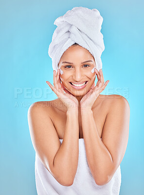 Buy stock photo Woman, happy and cream for skincare in studio on blue background with routine, ingredients and satisfied for results. Portrait, natural and smile in confidence with facial treatment and skin lotion