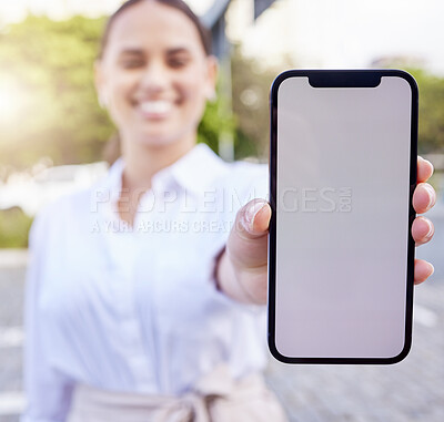 Buy stock photo Shot of an unrecognizable businesswoman using a smartphone outside
