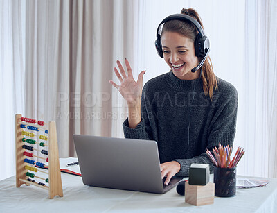 Buy stock photo Shot of a young teaching an online lesson with her laptop at home