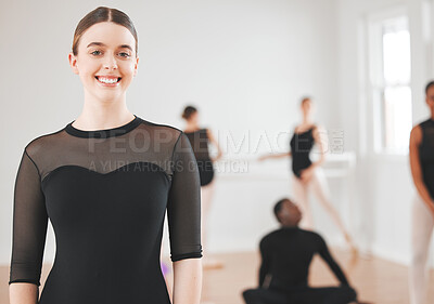 Buy stock photo Shot of a beautiful young ballet dancer standing in a dance studio