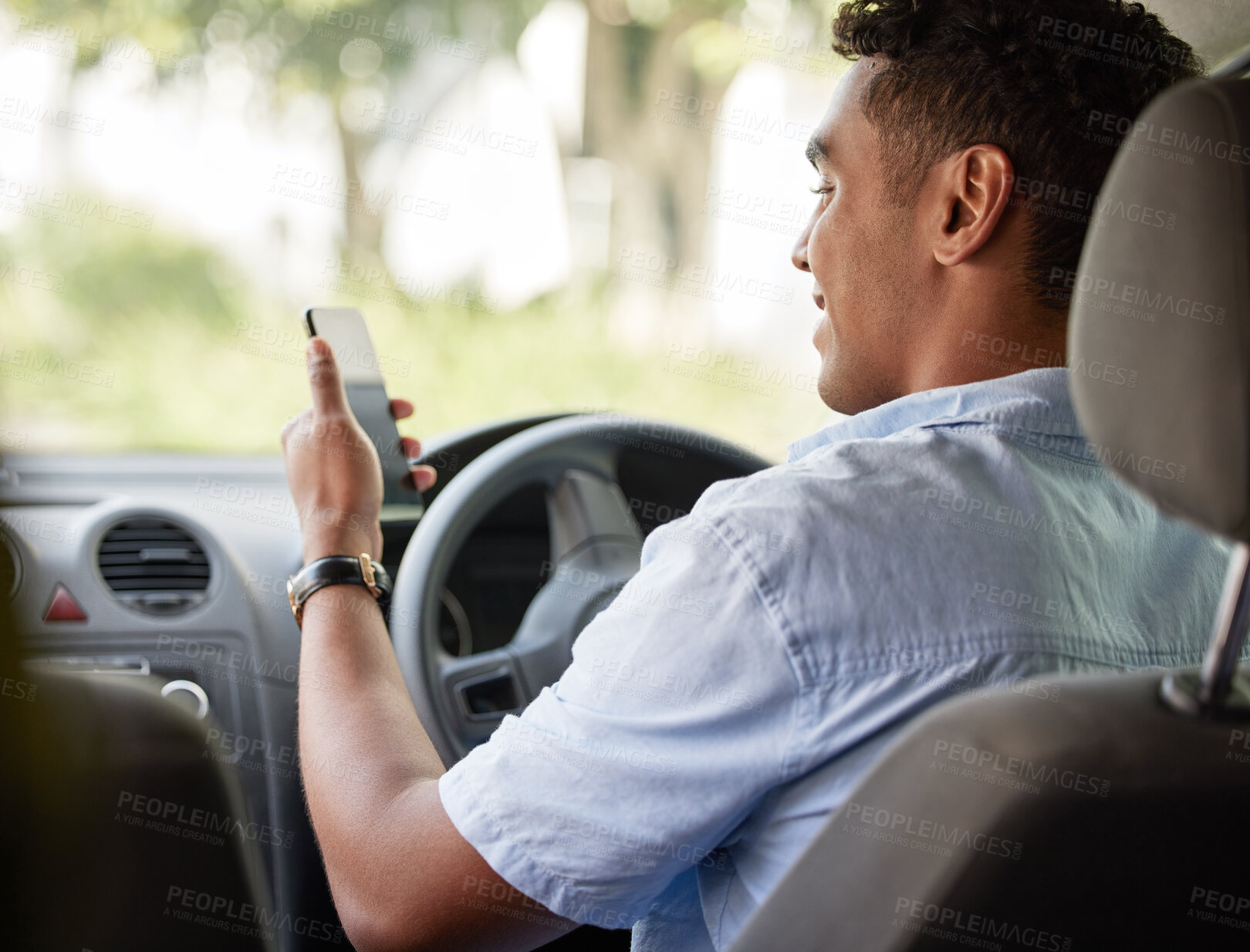 Buy stock photo Delivery man sitting in car with phone, smile and checking location, order or online map for logistics. Courier service, happy driver in van and internet connection on cellphone for logistic schedule