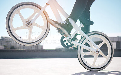 Buy stock photo Cropped shot of an unrecognizable man riding his BMX outside