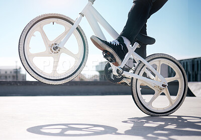 Buy stock photo Trick, legs of boy and riding bicycle for hobby, daily activity and cycling for fun. Outside, male person and cyclist on a bike for exercise, leisure time or freedom for playing with biker