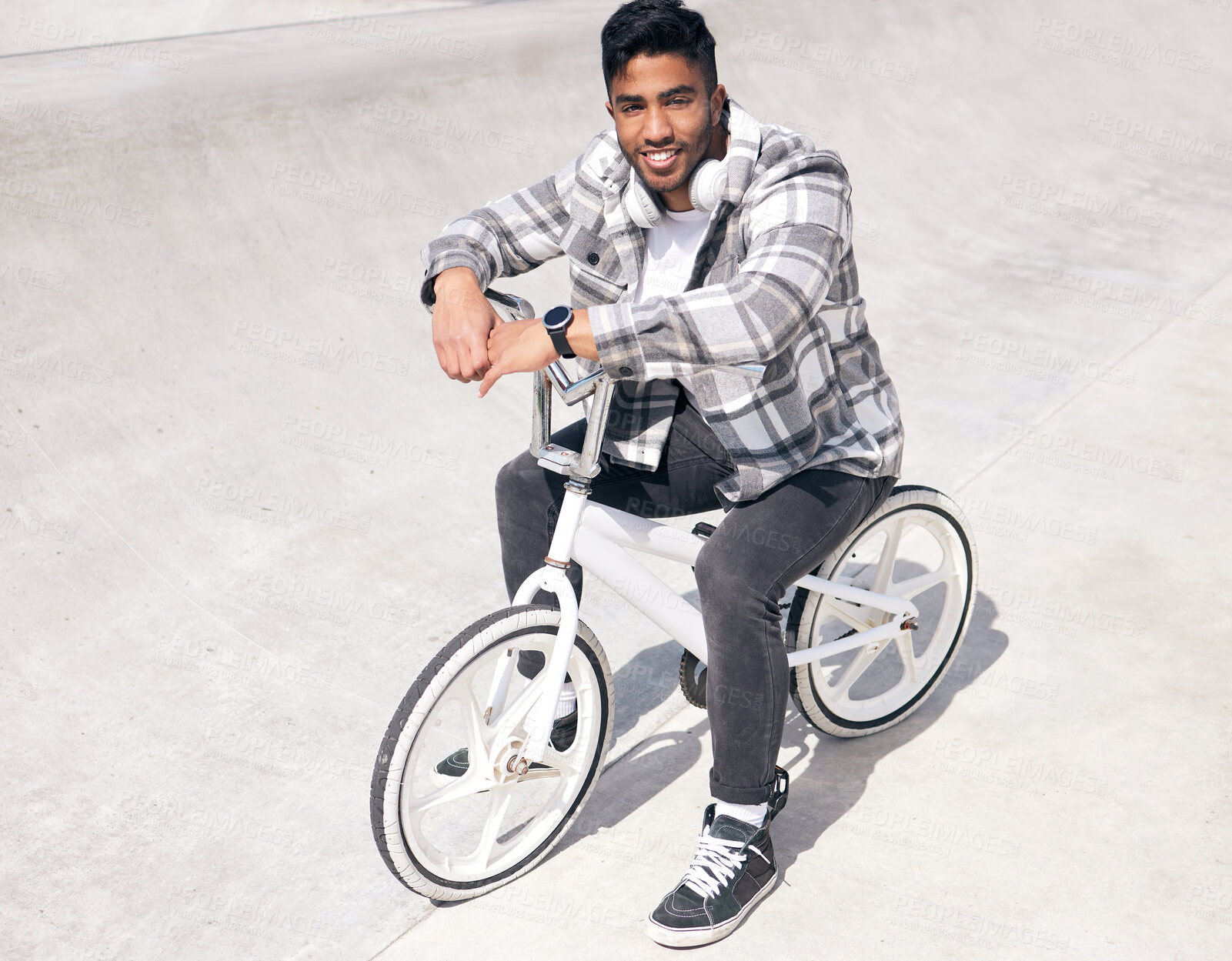 Buy stock photo Full length portrait of a handsome young man riding his BMX outside