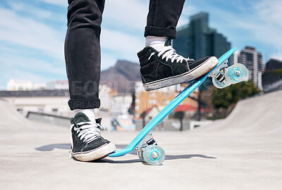 Buy stock photo Cropped shot of an unrecognizable man skateboarding outside