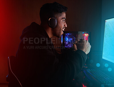 Buy stock photo Pro gamer, man and celebration for winning with fist, goals or success in global rpg contest on web. Person, winner and excited with cheers, challenge or competition with computer in home at night