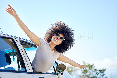 Buy stock photo Shot of a beautiful young woman enjoying an adventurous ride in a car