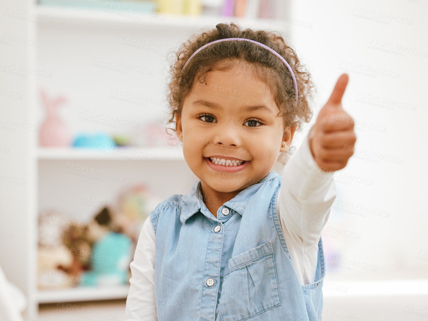 Buy stock photo Girl, happy kid and thumbs up in home portrait for support, thank you gesture and emoji in nursery. Female person, child and approval or agreement in motivation, yes icon and symbol for feedback