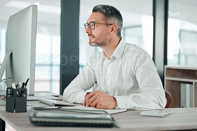 Buy stock photo Businessman, computer and thinking on email, reading and analysis for information, research and work. Mature business person, technology and planning for project, notebook and future company growth