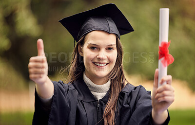 Buy stock photo Graduation, thumbs up and portrait of woman at university for education, diploma or success ceremony. Student, hand gesture and person with certificate for achievement, satisfaction or happiness