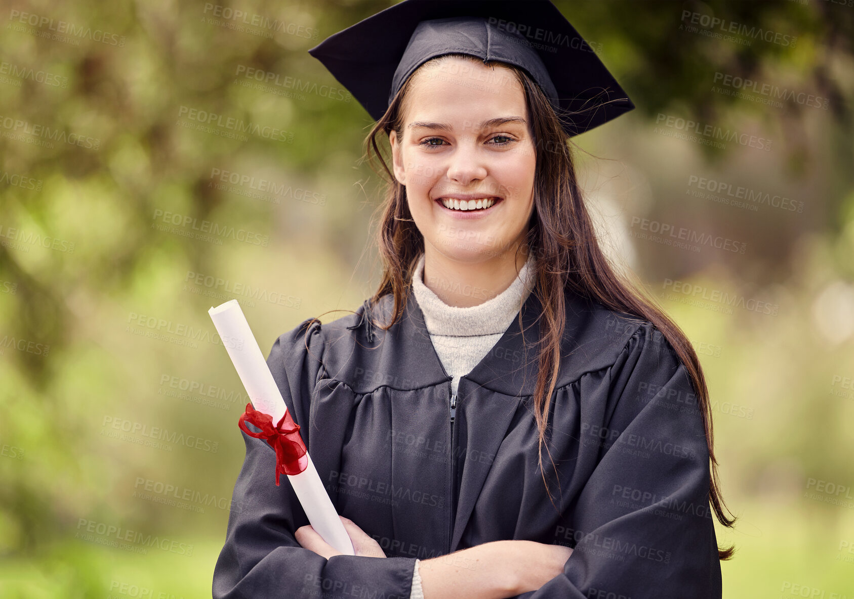 Buy stock photo Graduation, certificate and portrait of university woman with arms crossed for education, achievement or success ceremony. Student, bokeh and person with diploma for satisfaction, happiness or event