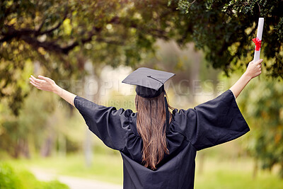 Buy stock photo Graduate, woman celebrate and open arms with degree and diploma at event outdoor with scholarship. Certificate, back and hand holding college paper with cheer, success and motivation with achievement