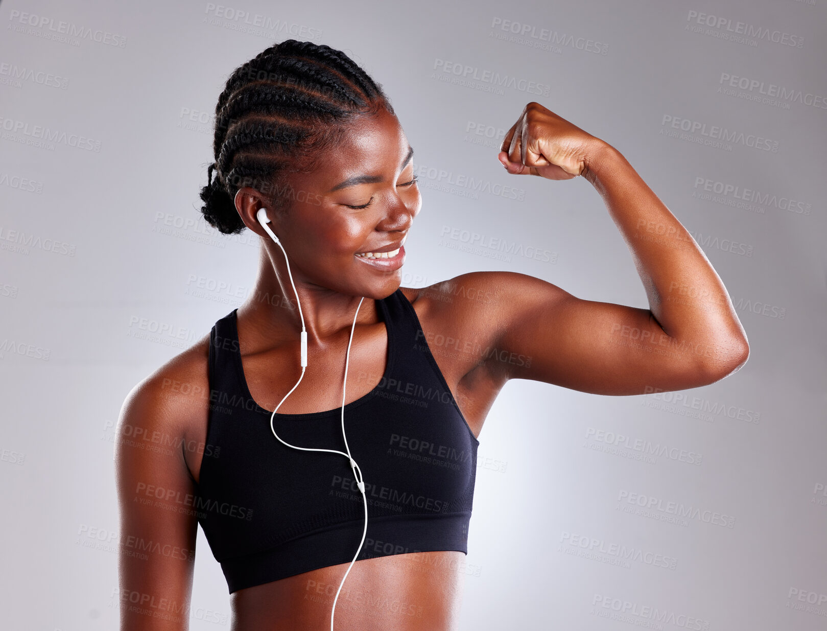 Buy stock photo Studio, black woman and flex with smile for fitness, bicep and strong muscle by mockup space. Female model, arm strength and bodybuilder in gray background for training, exercise and results for goal