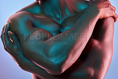 Buy stock photo Shot of a muscular man posing against a studio background