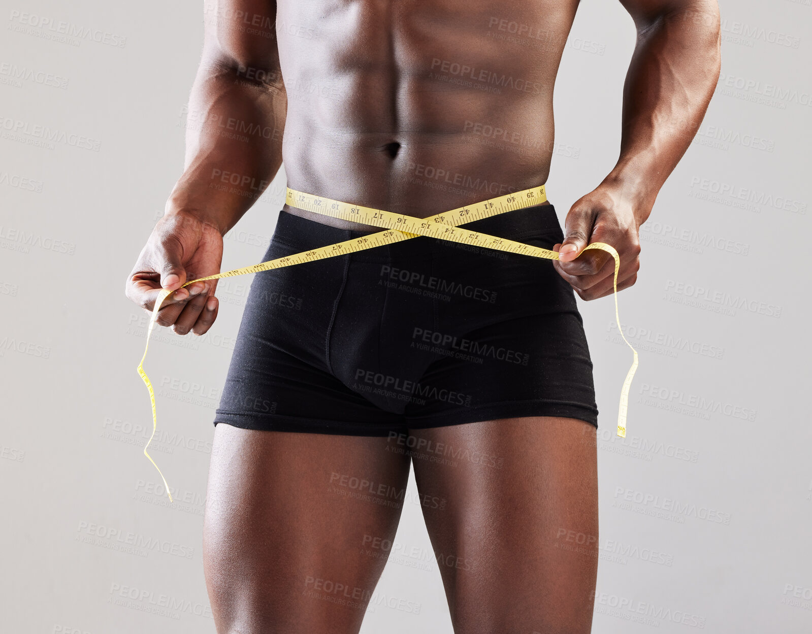 Buy stock photo Man, stomach and measure tape for fitness, results and weight loss with health or training progress in studio. Hands of bodybuilder check body or abs for exercise and workout on a white background