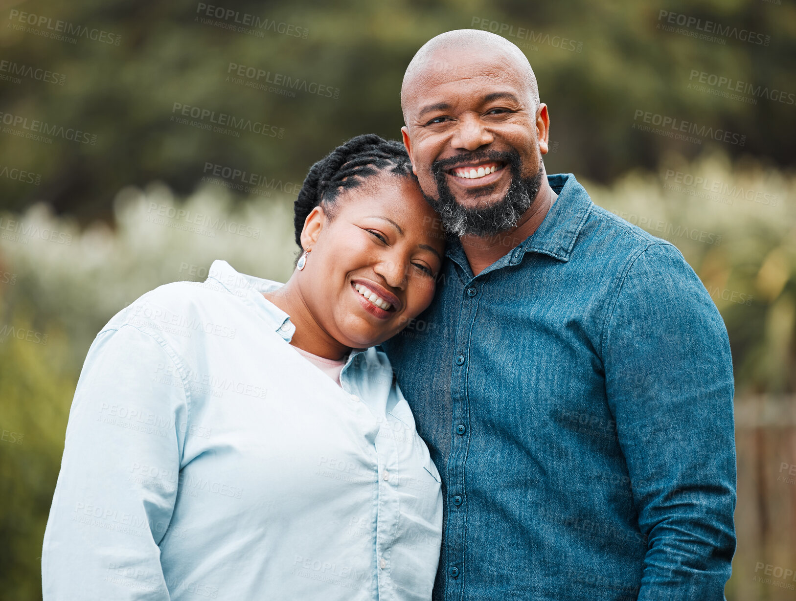 Buy stock photo Mature black couple, portrait and happy in garden with hug, connection and love with care in summer. Senior man, woman and smile in backyard with embrace, bonding and outdoor with sunshine in Kenya