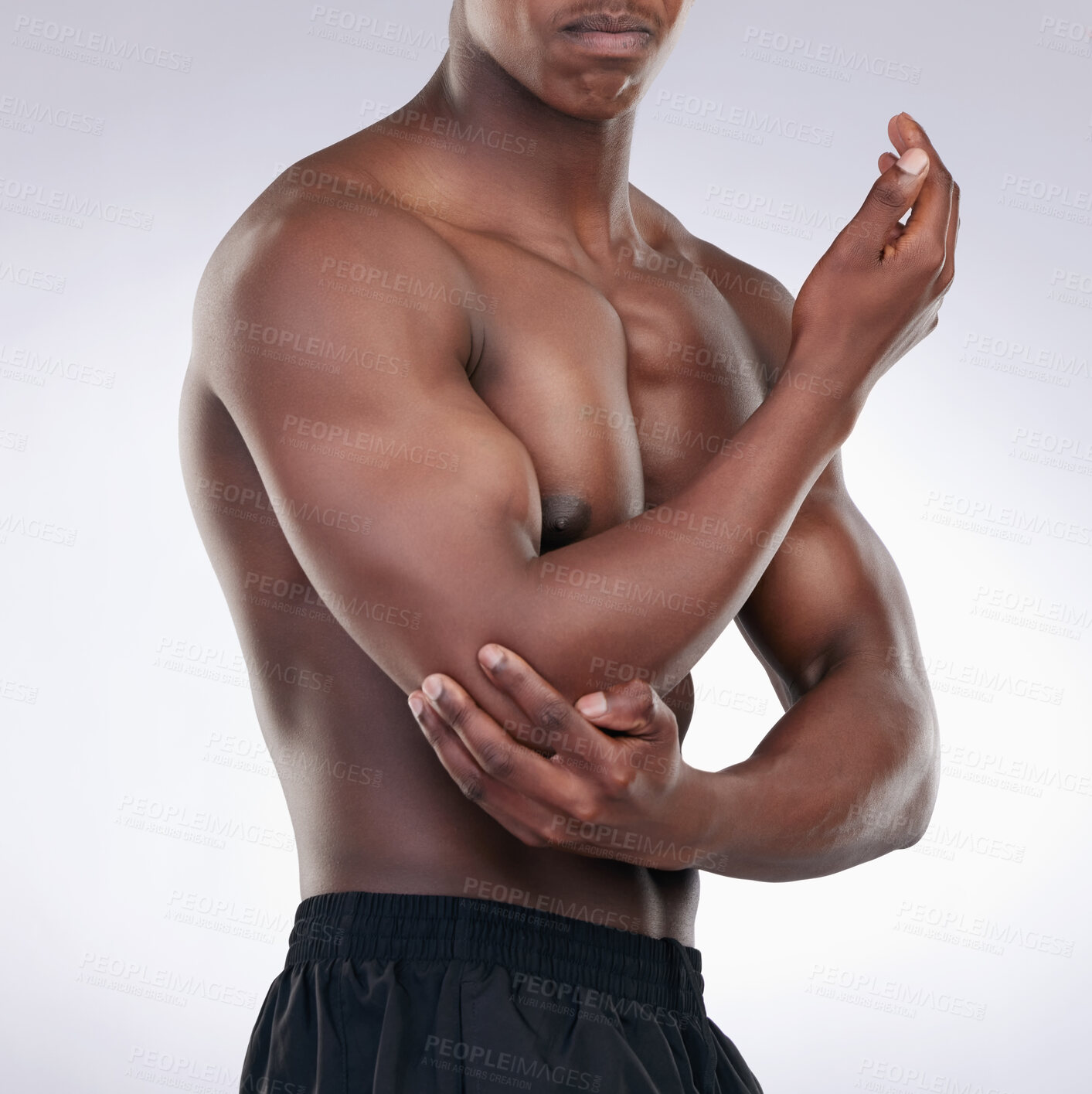 Buy stock photo African man, body and pain in arm on studio backdrop from exercise, injury and health problem. Male person, bodybuilder and sore elbow from fitness, training and sport accident by white background