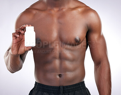 Buy stock photo Hands, supplements and pill bottle for man with fitness choice, decision or test by white background. Person, athlete and bodybuilder for drugs, medical or pharma product for muscle growth in studio