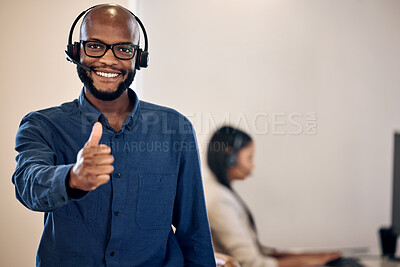 Buy stock photo Call center, thumbs up and a man smile for customer service, crm or telemarketing support. Black person, consultant or agent with headset and yes emoji or hand sign for sales, contact us or help desk