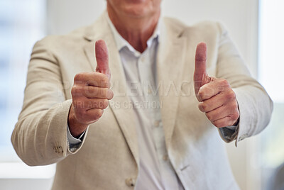 Buy stock photo Cropped shot of an unrecognisable businessman standing alone in the office and showing a thumbs up