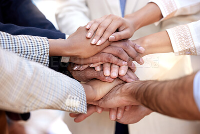 Buy stock photo Shot of a group of unrecognizable businesspeople stacking their hands