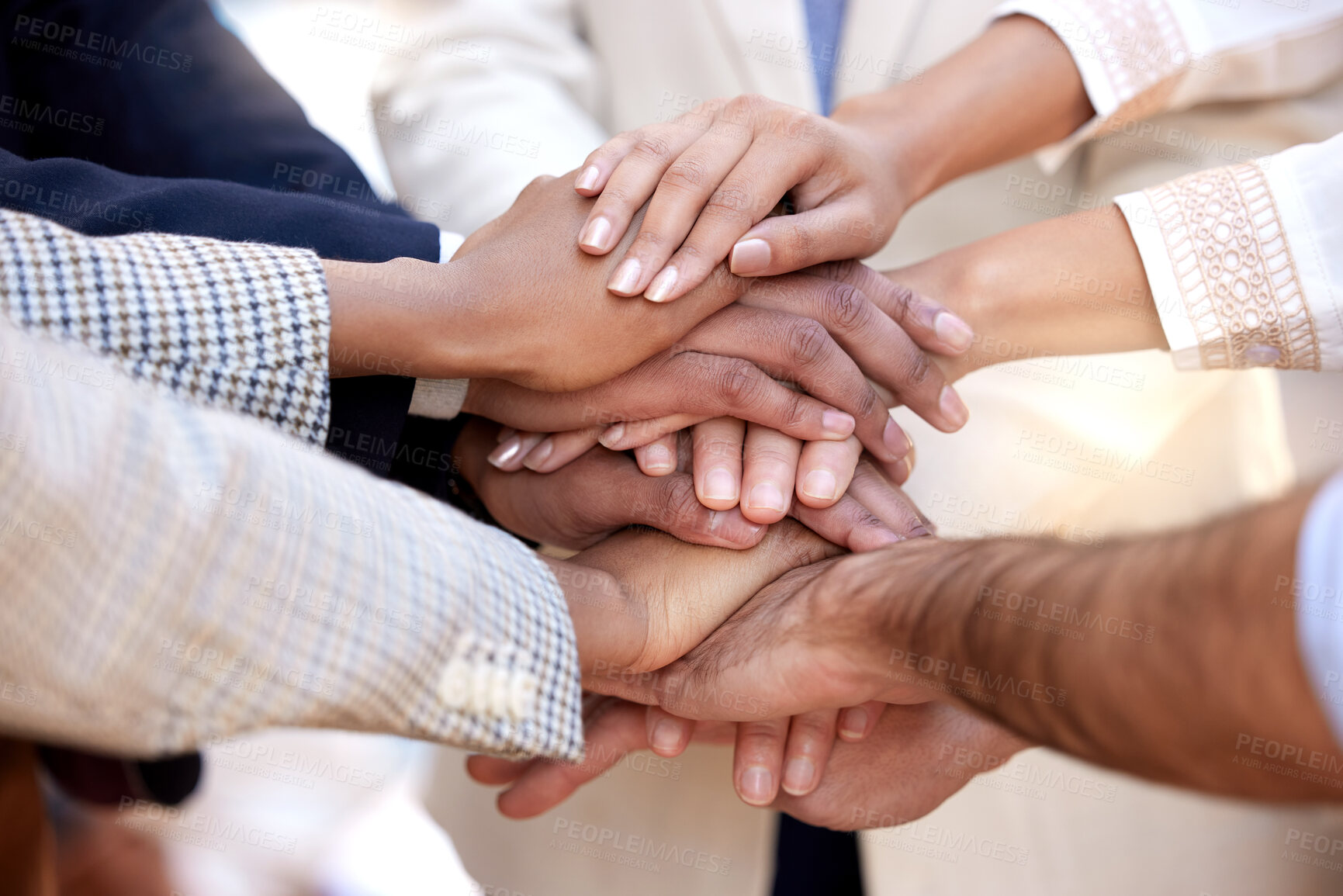 Buy stock photo Shot of a group of unrecognizable businesspeople stacking their hands