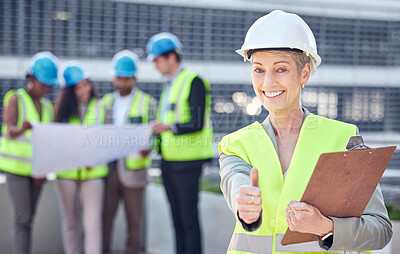 Buy stock photo Engineer, construction and woman manager thumbs up outdoor for civil engineering and architecture. Portrait of leader and gender equality with architect people and hand sign for project success  