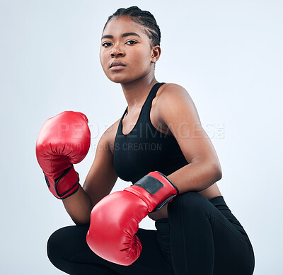 Buy stock photo Black girl, portrait and boxer ready in studio, gloves and warrior for fight on white background. Female person, exercise and martial arts practice or challenge, training and fitness for battle