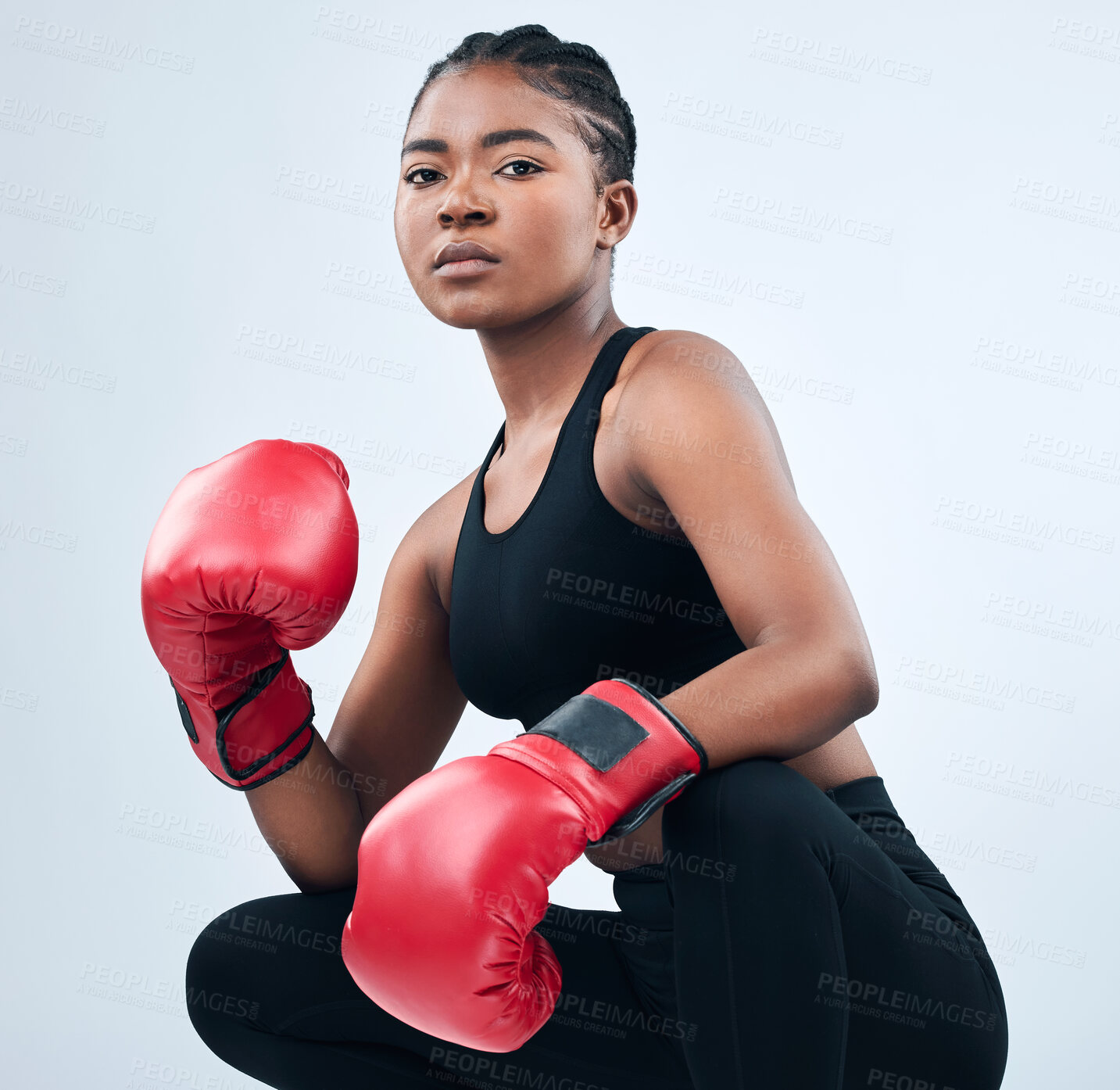 Buy stock photo Black girl, portrait and boxer ready in studio, gloves and warrior for fight on white background. Female person, exercise and martial arts practice or challenge, training and fitness for battle