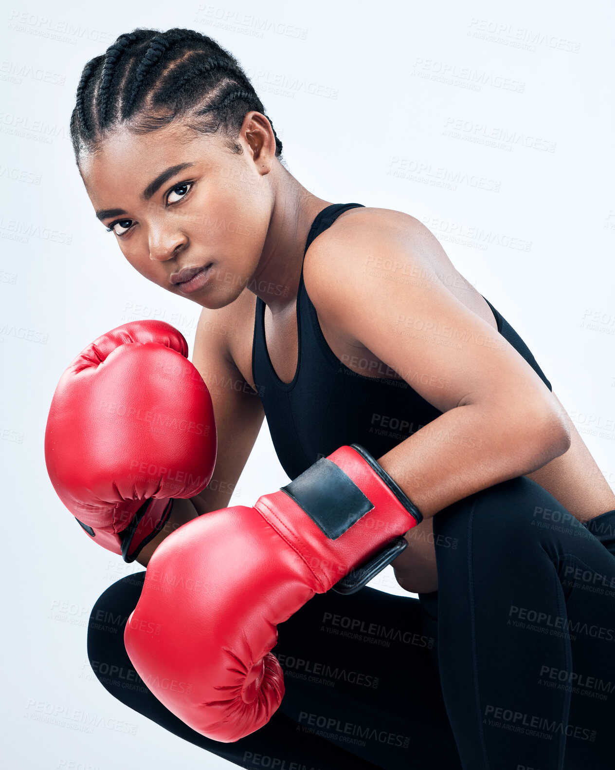 Buy stock photo Black girl, portrait and boxing gloves for exercise in studio, serious and fight on white background. Female person, warrior and martial arts practice or challenge, training and fitness for battle