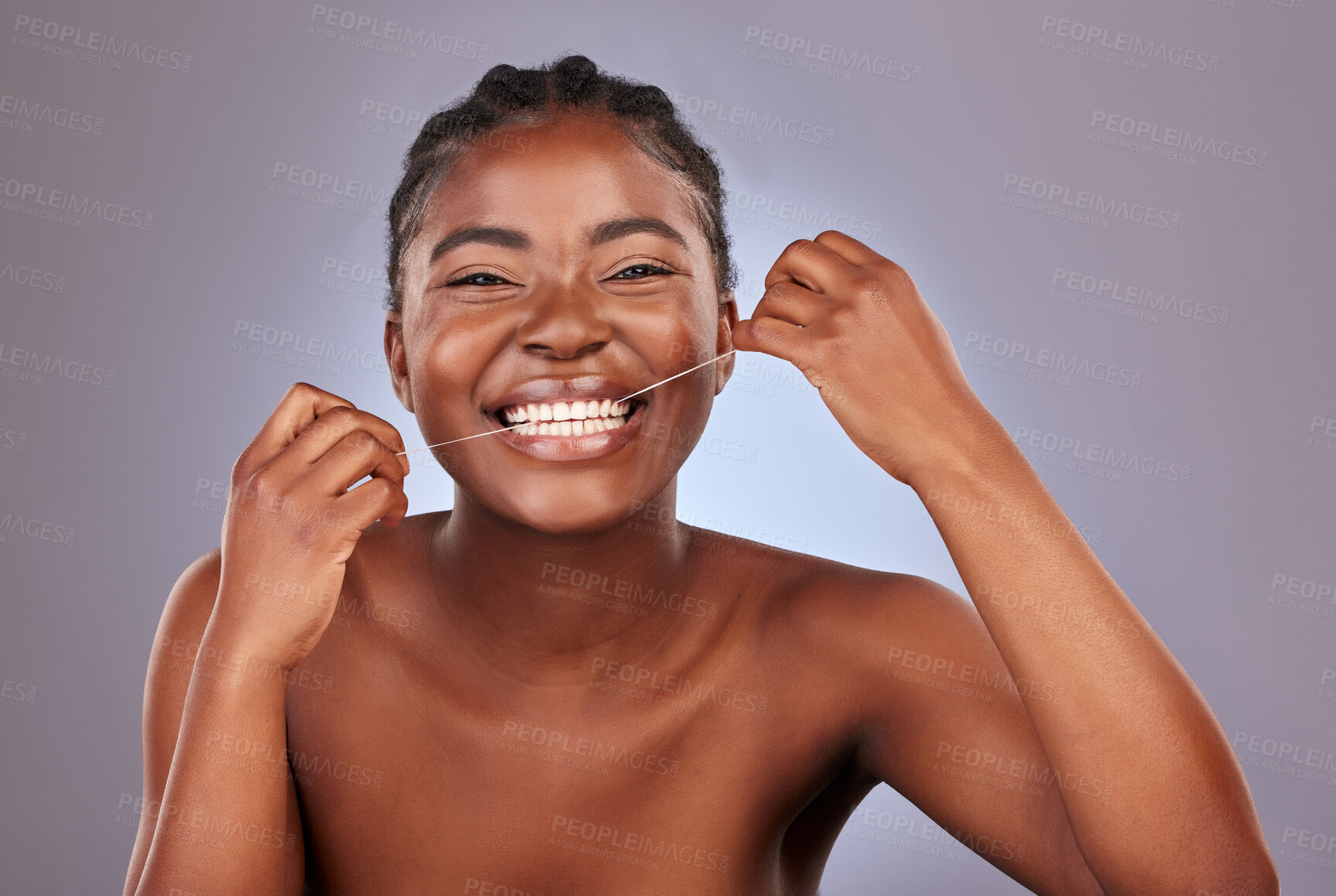 Buy stock photo Floss, smile and portrait of woman in studio with oral health, morning and wellness routine for self care. Happy, hygiene and person clean teeth for plaque removal dental treatment by gray background