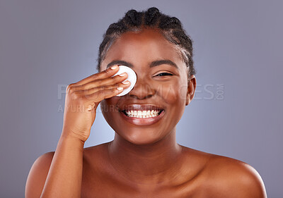 Buy stock photo Beauty, cotton and portrait of natural black woman in studio on gray background for cosmetic wellness. Aesthetic, facial and cleaning with happy model at spa for dermatology or skincare treatment