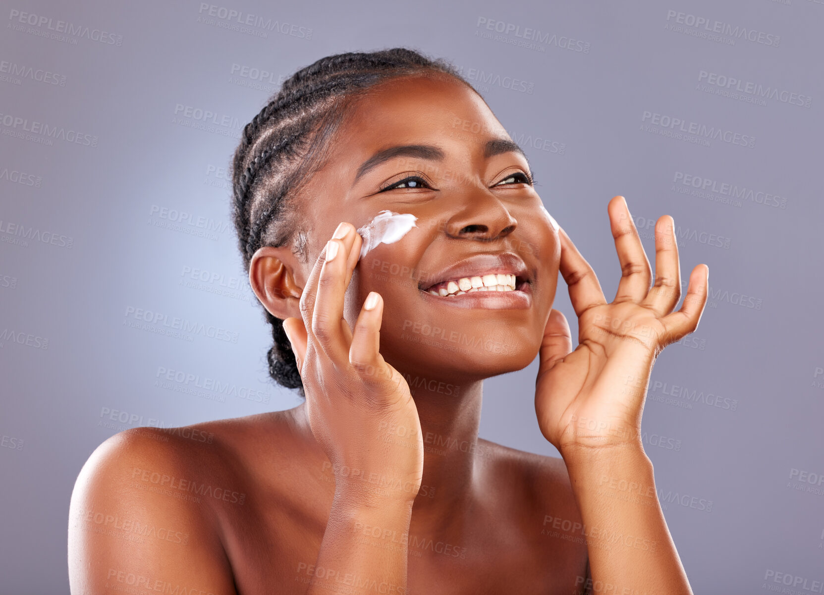 Buy stock photo Black woman, cosmetics and beauty with moisturizer, product and happy for results with face cream. African, female person and excited for skincare, pride and glow for dermatology in gray background
