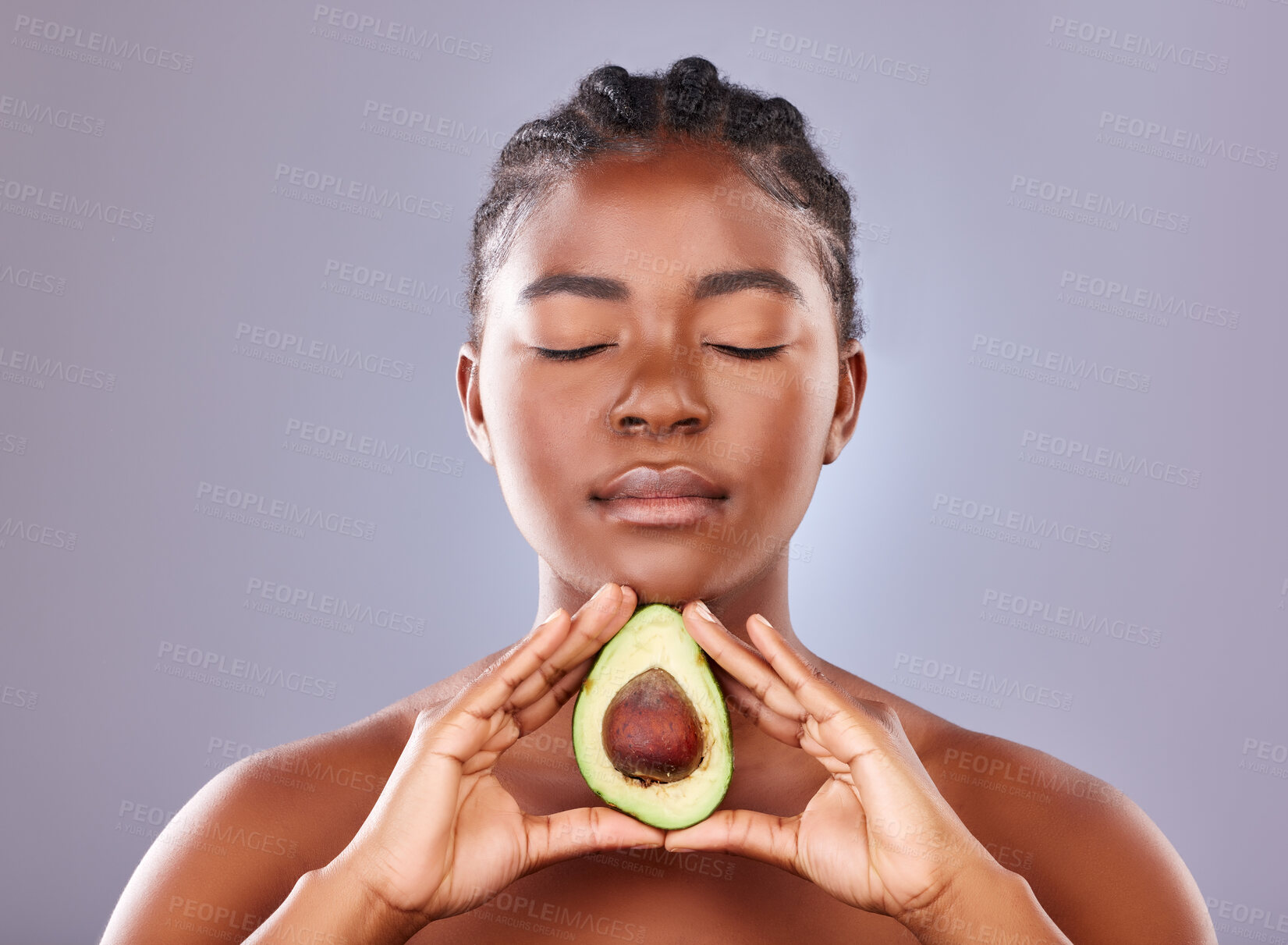 Buy stock photo Black woman, skincare and beauty with avocado, product and eyes closed with organic moisturizer for results. African, female person and cosmetics for pride, glow and dermatology in studio background
