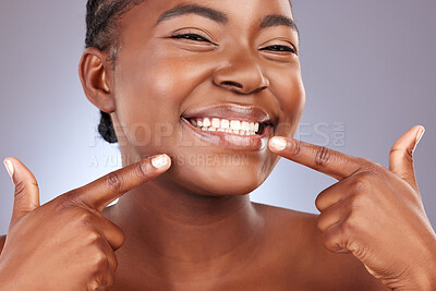 Buy stock photo Black woman, portrait and dental hygiene for teeth in studio with cleaning, whitening and gum treatment. Smile, person and mouth for oral care, veneers or excited results on purple background