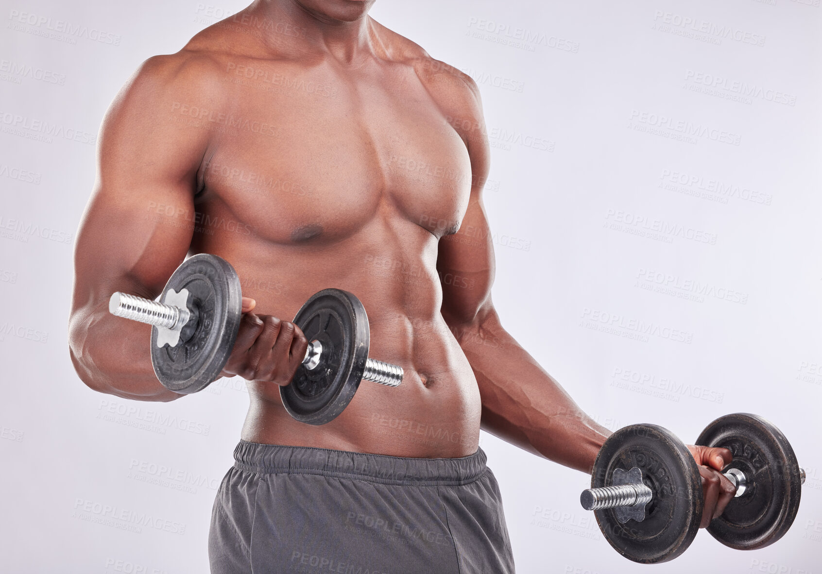 Buy stock photo Dumbbells, muscle and black man for health with exercise and sport training for competition in studio. African guy, bodybuilder and strong body with weightlifting for wellness by white background