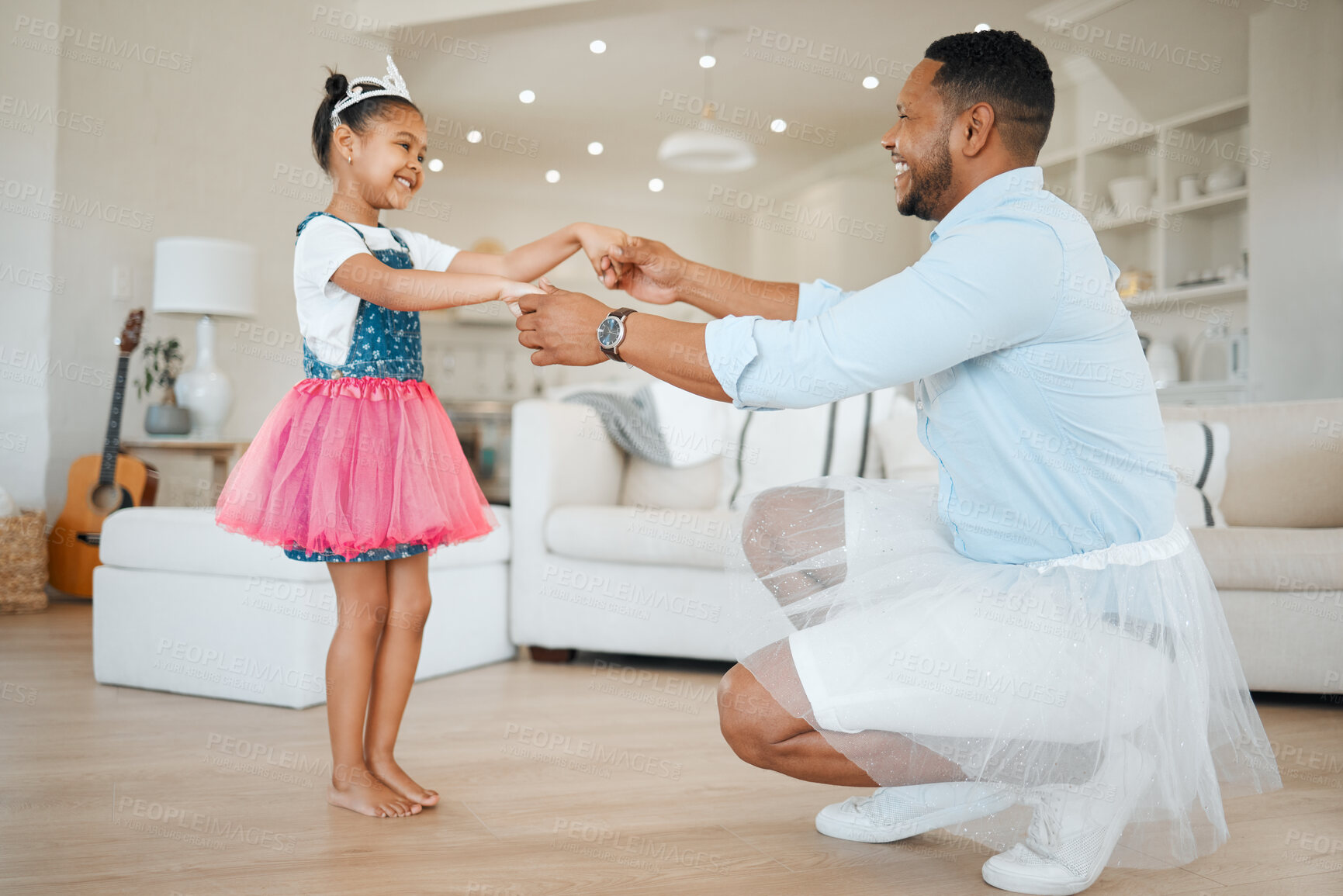 Buy stock photo Happy father, daughter and dancing with princess in tutu for bonding, performance or practice with daddy at home. Dad, child or little girl with cosplay for fun childhood, support or love at house