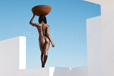 Buy stock photo Rearview shot of an unrecognizable young woman posing nude outdoors