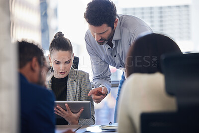 Buy stock photo Digital tablet, discussion and business people doing research together in a meeting in the office. Technology, professional and corporate team working on a project in collaboration in the boardroom.