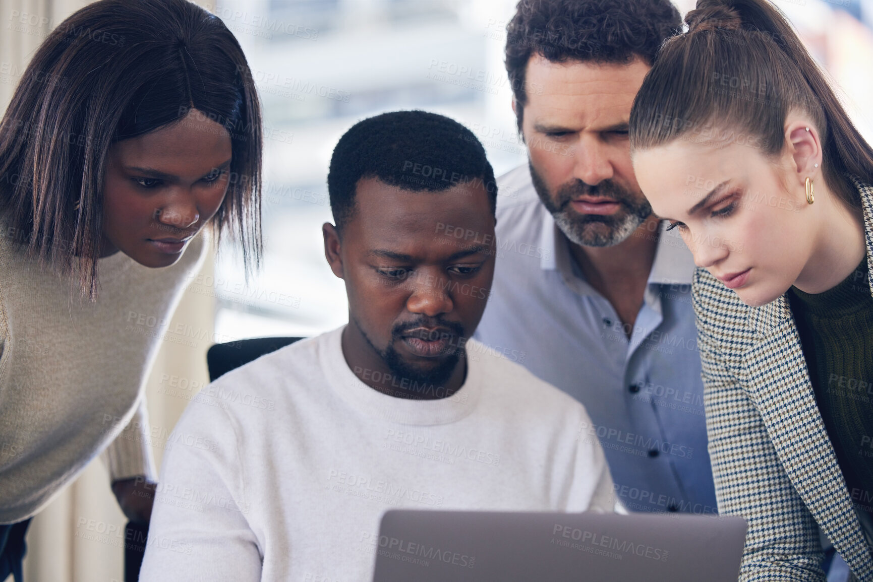 Buy stock photo Group, people and diversity on laptop with serious, expression and workplace for solution. Team, problem and multicultural in office as colleagues in collaboration on project as developer in digital