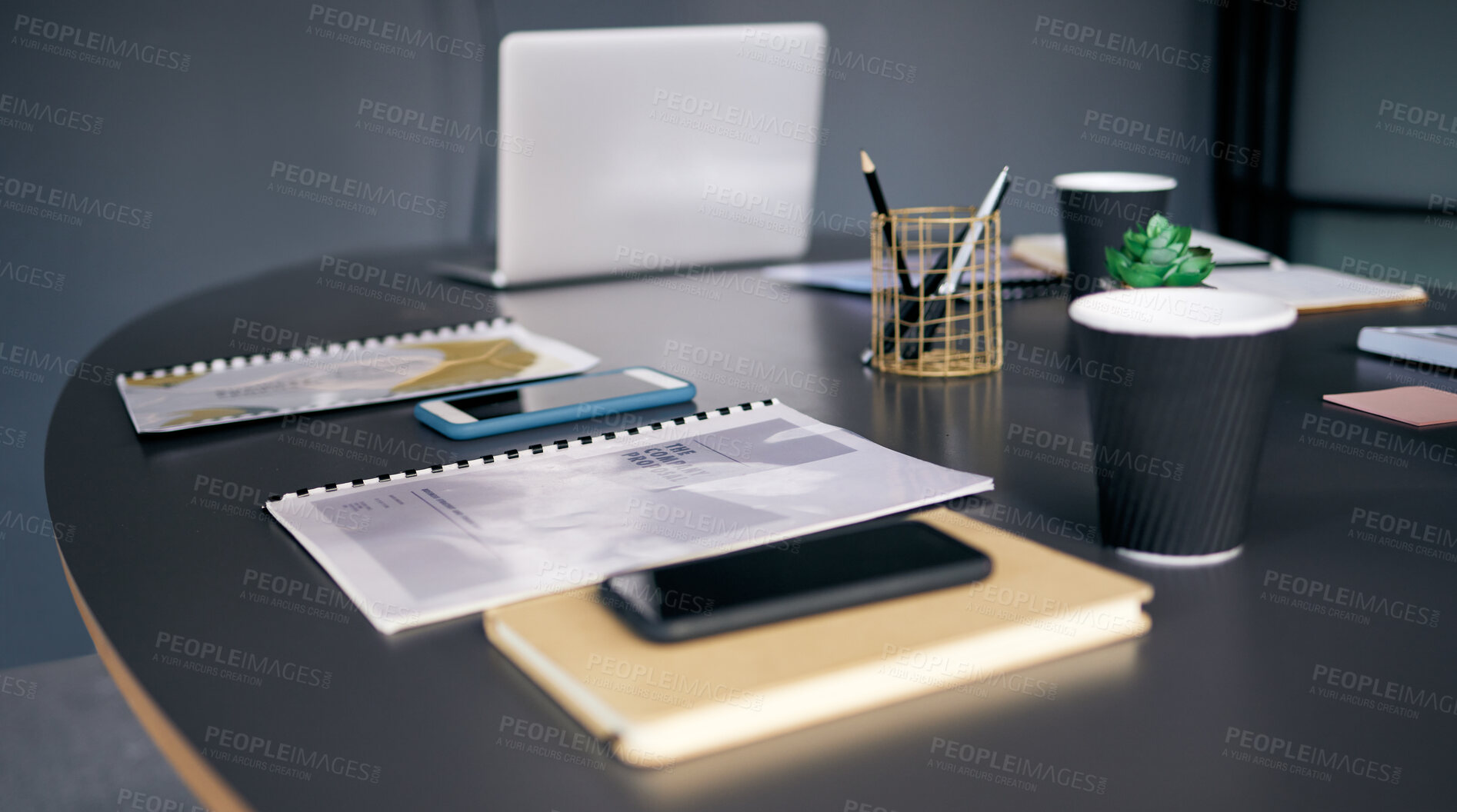 Buy stock photo Empty office, table or portfolio in agency interior or desk with pens, file and stationery for business or plan. Project, background and modern workspace with laptop, notebook and coffee beverage
