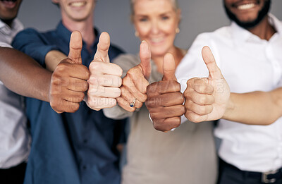 Buy stock photo Group closeup, thumbs up and hands for business people by wall with emoji, diversity and insurance agency. Men, women and goal with smile for team building, solidarity and collaboration in portrait