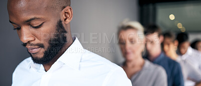 Buy stock photo Shot of a group of businesspeople waiting in line