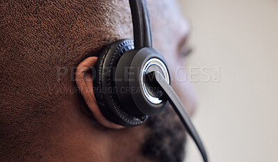 Buy stock photo Closeup shot of a call centre agent working in an office