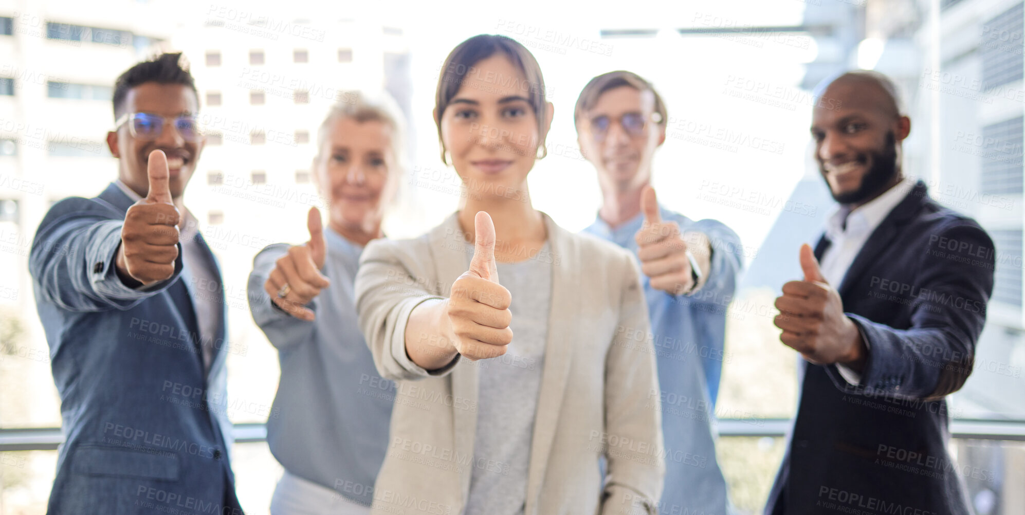 Buy stock photo Closeup shot of a group of businesspeople showing thumbs up together in an office