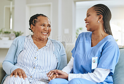 Buy stock photo Senior woman, nurse and laughing together for support, healthcare and happiness at retirement home. Black person or patient and caregiver holding hands for trust, elderly care and help for wellness 
