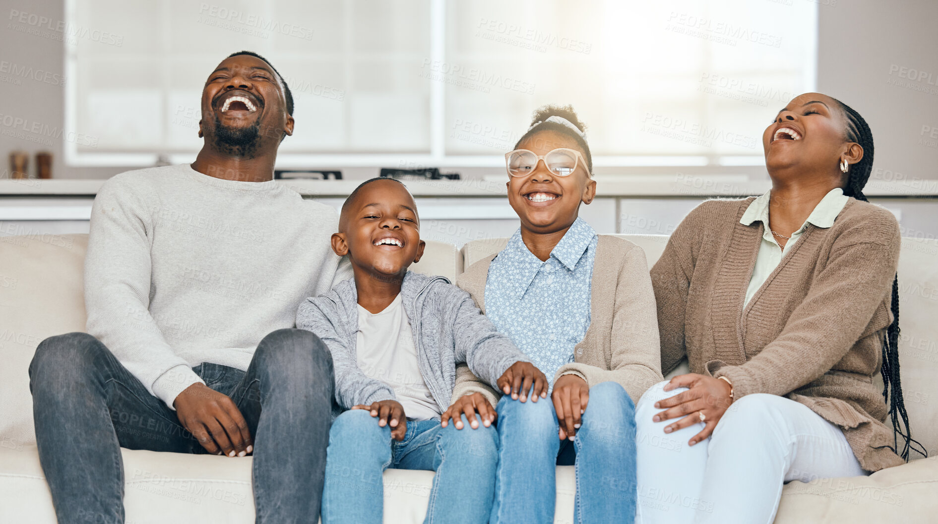 Buy stock photo Home, funny and black family on sofa, happiness and cheerful with joke, bonding together and joy. African people, parents and mother with father, kids and children with fun or laughing in living room