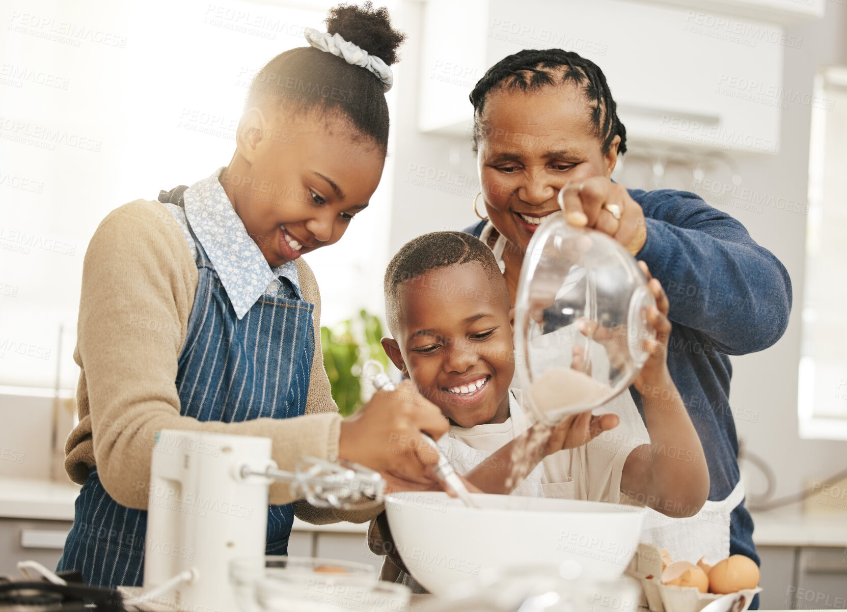 Buy stock photo Happy family, grandma teaching kids baking and learning baker skill in kitchen with help and support. Old woman, girl and boy with flour, development for growth and bake with ingredients at home